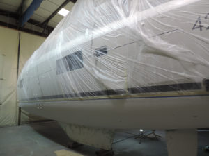 2B3's fill and fair hull treatment prior to coppercoat at Mylor Yacht Harbour
