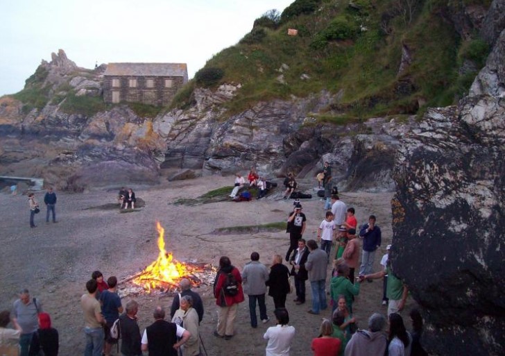Lighting of the bonfire at Polperro Festival. Photo supplied by Visit Cornwall