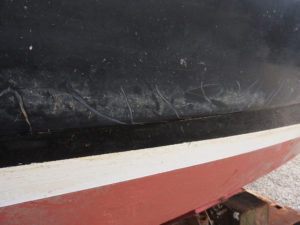 Hull damage to Cormish Yawl, repaired by Mylor yacht harbour