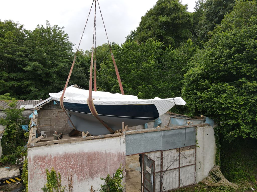 Holman 43 Cass being lifted out of her shed in Truro. Picture by Simon Mitchell